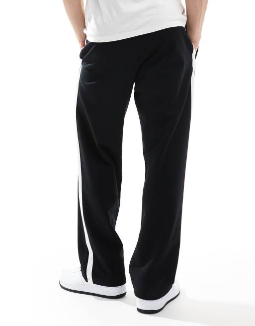 ASOS DESIGN heavyweight oversized trackies with side stripe 400gsm in black, 2 of 5