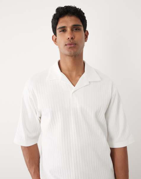 ASOS DESIGN heavyweight relaxed polo with half sleeves in white wide rib - view 1