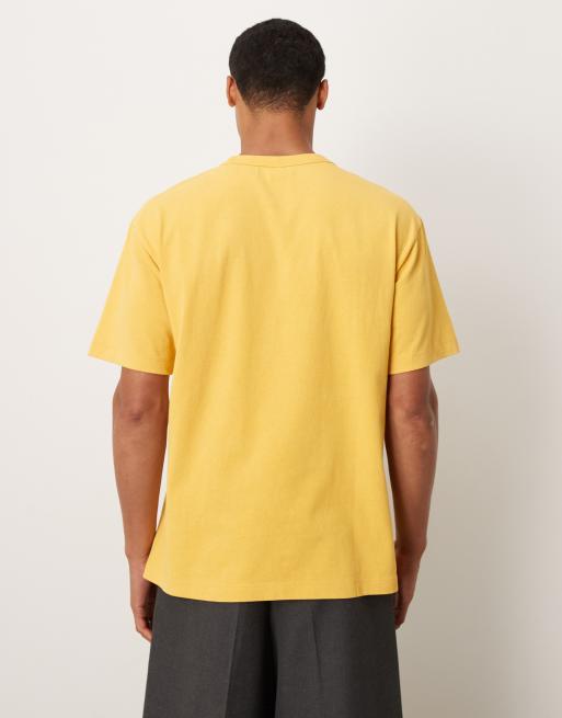 ASOS DESIGN heavyweight relaxed t-shirt with NYC graphic in washed yellow , 3 of 5