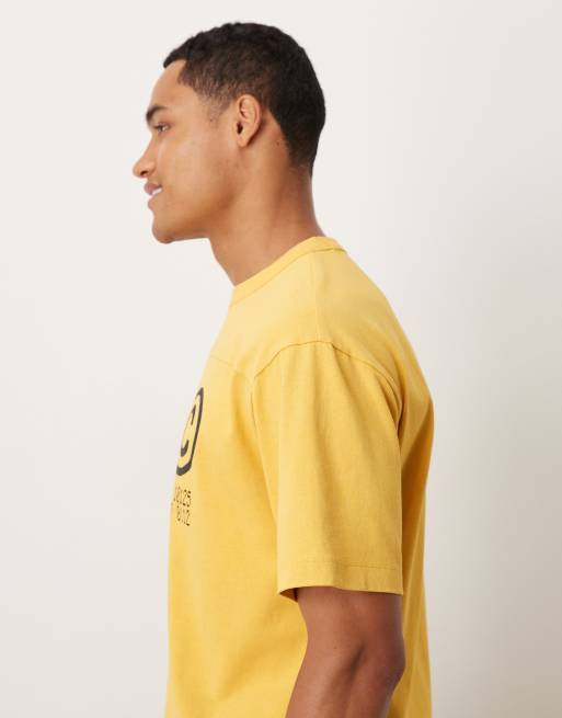 ASOS DESIGN heavyweight relaxed t-shirt with NYC graphic in washed yellow , 4 of 5