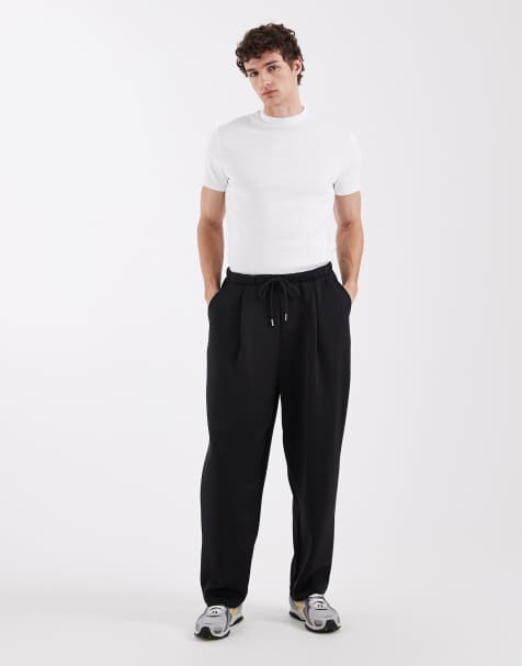ASOS DESIGN heavyweight scuba-style fabric relaxed taper sweatpants in black - view 1