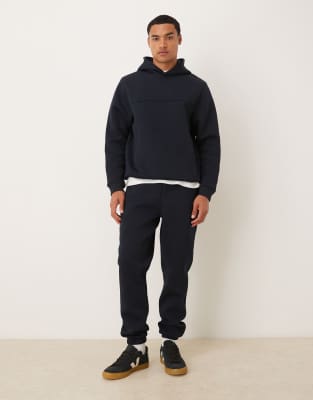 ASOS DESIGN heavyweight skinny sweatpants in scuba-style fabric in navy