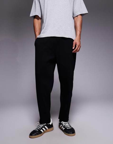 ASOS DESIGN heavyweight straight leg sweatpants with fixed hem and pin tucks in black - view 1