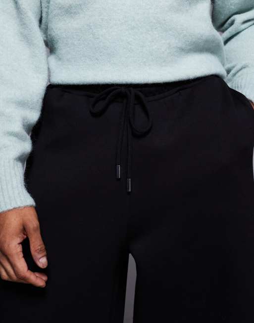 ASOS DESIGN heavyweight super wide leg sweatpants in scuba-style fabric in black