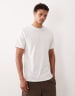 ASOS DESIGN relaxed tapered cargo trousers in black with pleats