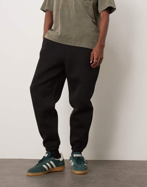 ASOS DESIGN heavyweight tapered jogger in scuba-style fabric in black, 4 of 5