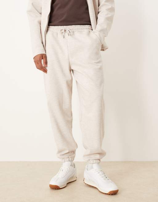 ASOS DESIGN heavyweight tapered jogger in scuba-style fabric in oatmeal marl, 2 of 5
