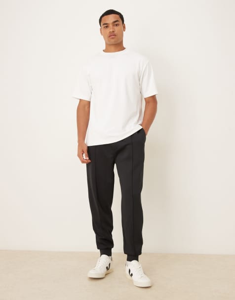 ASOS DESIGN heavyweight tapered sweatpants in scuba-style fabric in black - view 1