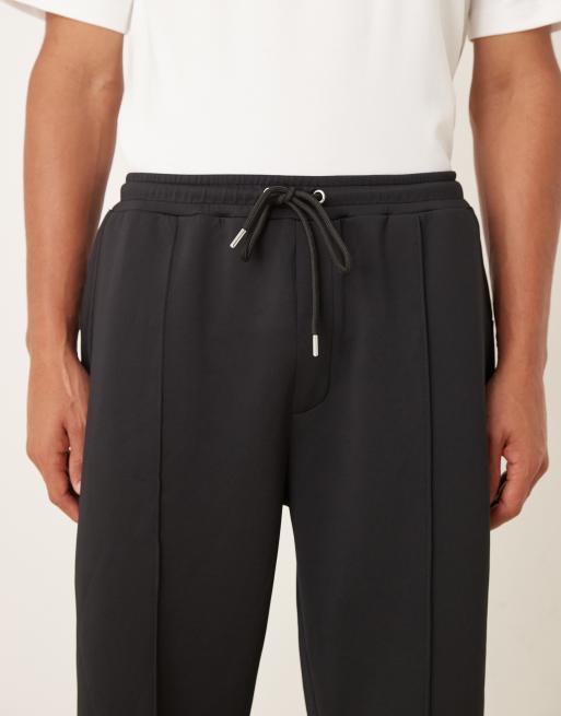 ASOS DESIGN heavyweight tapered sweatpants in scuba-style fabric in black, 4 of 5
