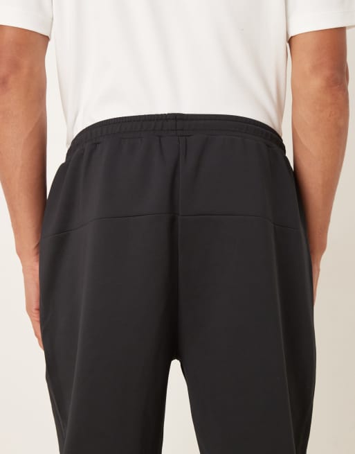 ASOS DESIGN heavyweight tapered sweatpants in scuba-style fabric in black, 5 of 5