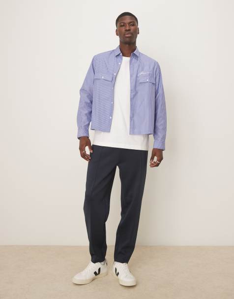 ASOS DESIGN heavyweight tapered trackies in scuba-style fabric in navy - view 1