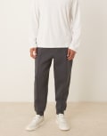 [ASOS DESIGN] ASOS DESIGN heavyweight tapered trackies in scuba-style fabric with pin tucks in charcoal-Grey S Asphalt