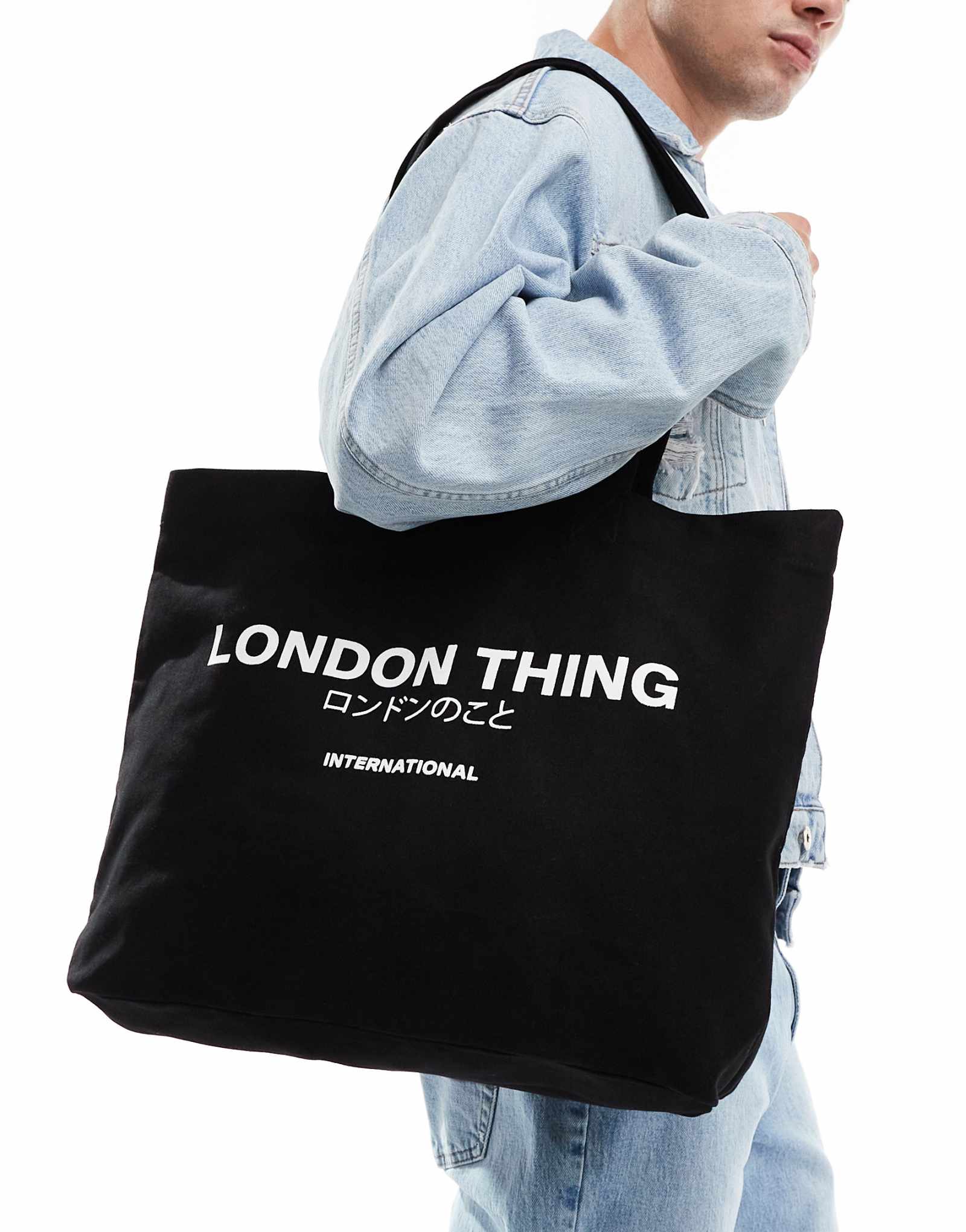 Сумка-тоут ASOS DESIGN heavyweight с рисунком Лондона черного цвета
