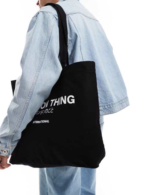 ASOS DESIGN heavyweight tote with London graphic in black