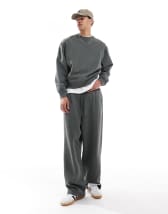 ASOS DESIGN tapered scuba trackies with pleat detail in black