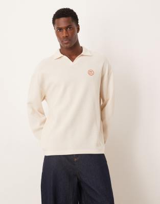 ASOS DESIGN heavyweight waffle oversized long sleeve t-shirt with embroidered smile in off white