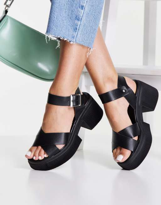 ASOS DESIGN - Hebe - Sandalen met halfhoge hak, dikke zool en kruisbandjes in zwart