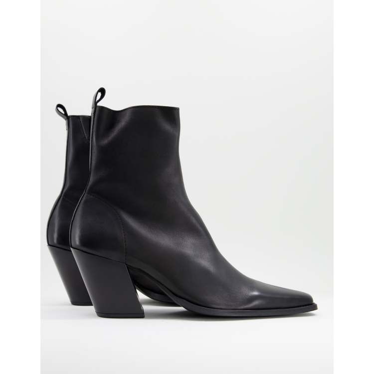 ASOS DESIGN heeled black leather chelsea boot with angled  display picture 1