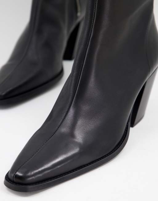 Angled discount heel boots