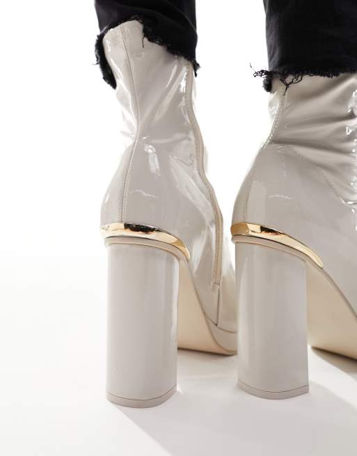 Cream best sale patent boots