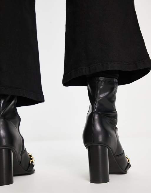 ASOS DESIGN heeled boots in black faux leather with gold chain detail , 2 of 4
