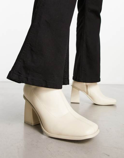 ASOS DESIGN heeled chelsea boot in cream faux leather