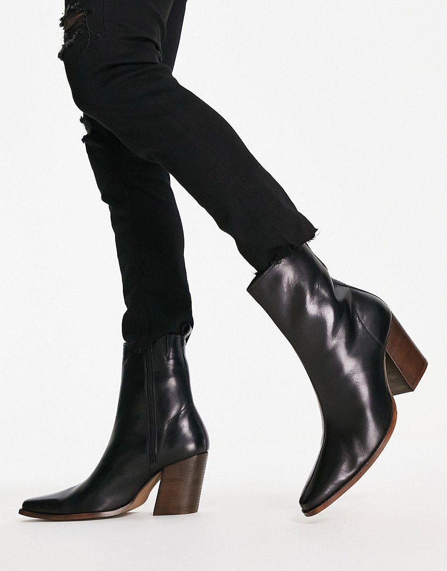 ASOS DESIGN heeled chelsea boot with angled heel in black leather with natural sole