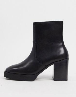 ASOS DESIGN heeled chelsea boots in black leather on black platform ...