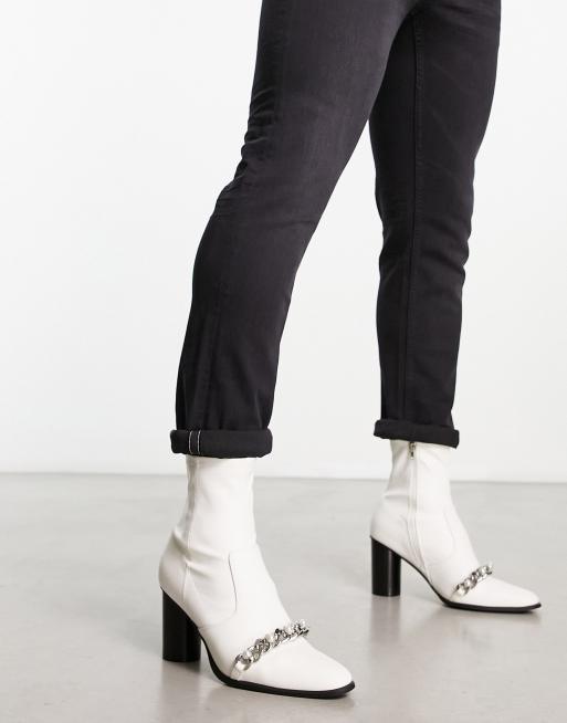 White faux store leather ankle boots