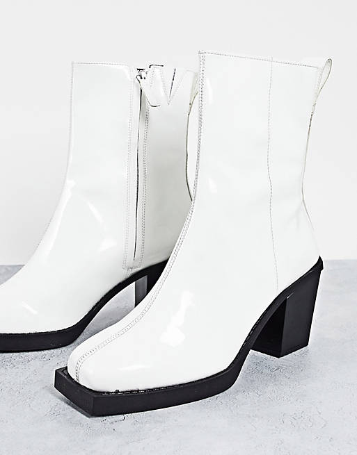 ASOS DESIGN heeled chelsea boots in white patent leather with black sole