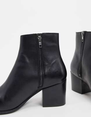 black pointed heeled boots