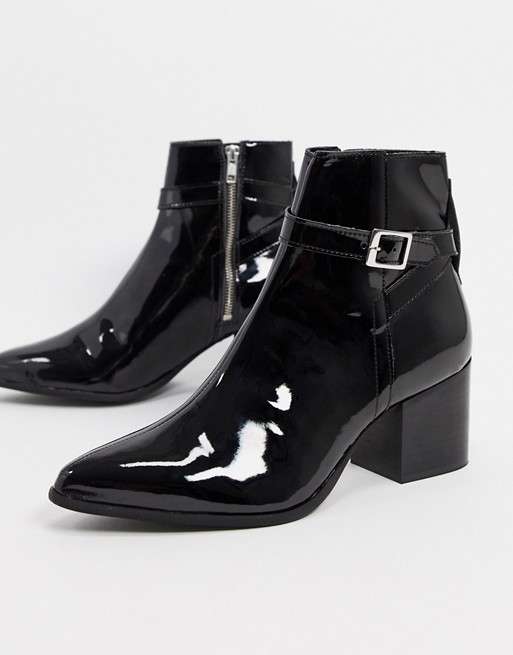 ASOS DESIGN heeled chelsea boots with pointed toe in black patent leather with strap detail