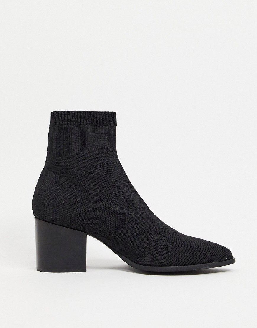 ASOS DESIGN heeled Chelsea sock boots with pointed toe in black
