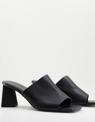 ASOS DESIGN heeled mules in black in faux leather