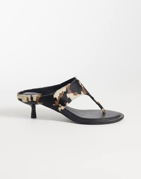 ASOS DESIGN – Helix – Skórzane japonki premium na obcasie z włosiem w krowie łaty - view 1