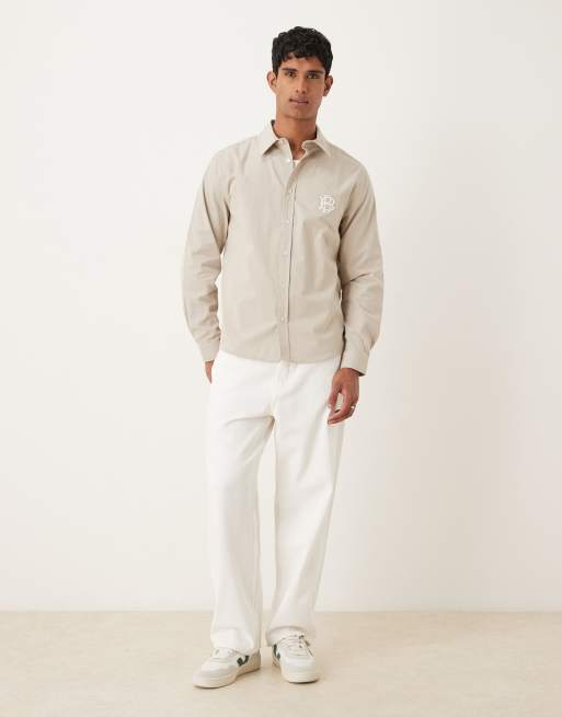 ASOS DESIGN – Hemd aus Baumwollpopeline in Buttermilchgelb mit Stickerei auf der Brust, 2 von 5