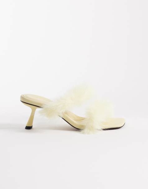 ASOS DESIGN Hercules faux fur minimal mid heeled mules in lemon - view 1