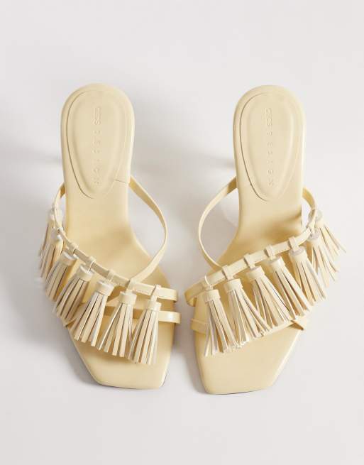 ASOS DESIGN – Hibernate – Mules in Buttermilchgelb mit mittelhohem Absatz und Quastendetail, 2 von 4