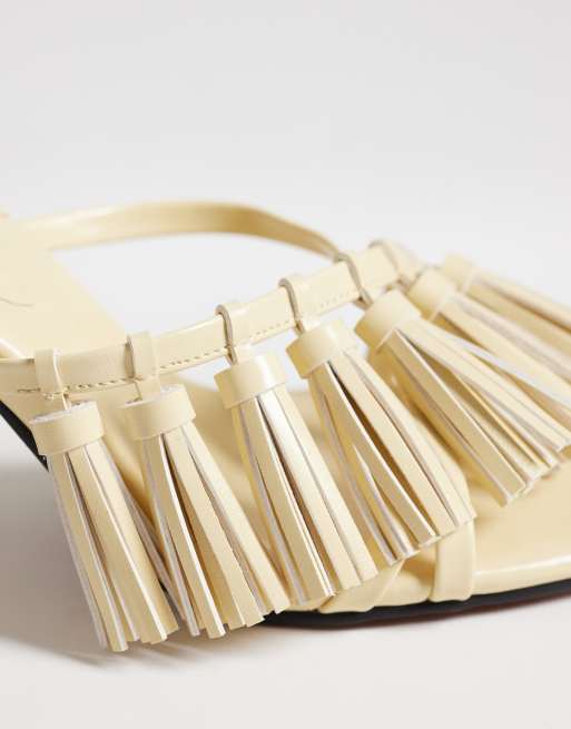 ASOS DESIGN – Hibernate – Mules in Buttermilchgelb mit mittelhohem Absatz und Quastendetail, 3 von 4