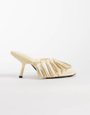 ASOS DESIGN Hibernate tassel trim mid heeled mules in buttermilk