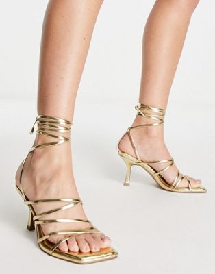 Asos Design Hiccup Strappy Tie Leg Mid Heeled Sandals In Gold