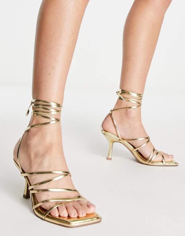 ASOS DESIGN Hiccup strappy tie leg mid heeled sandals in gold