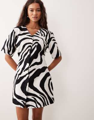 Asos Design High Break Point Short Sleeve Denim Mini Dress In Animal Print