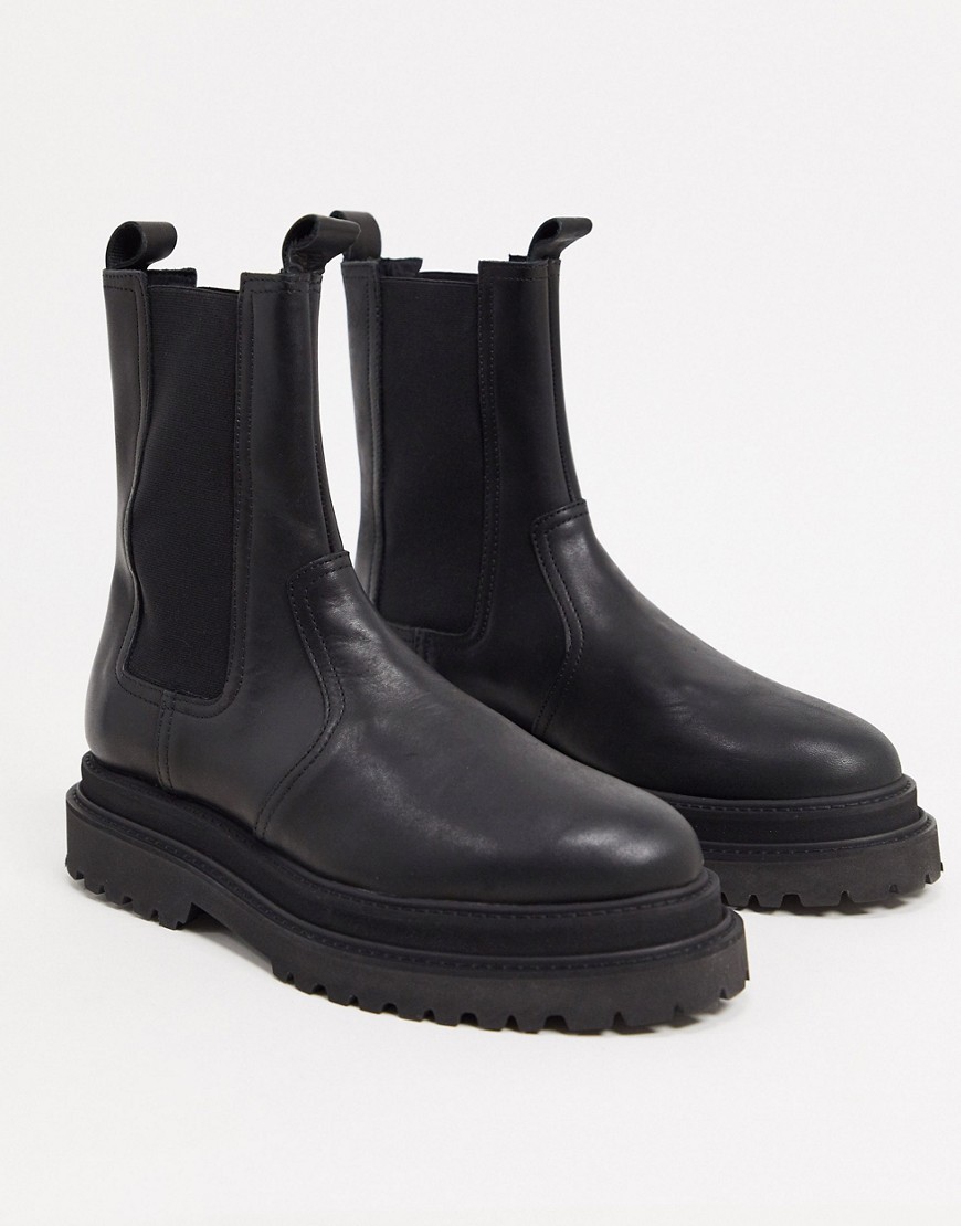 ASOS DESIGN high chelsea calf boots on stacked sole in black high shine leather