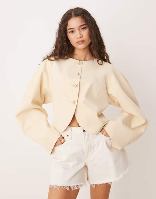 ASOS DESIGN high neck cocoon sleeve blazer with gold button detail in buttermilk