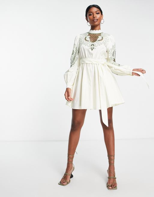 ASOS DESIGN high neck cutwork belted mini dress in stone with green detail