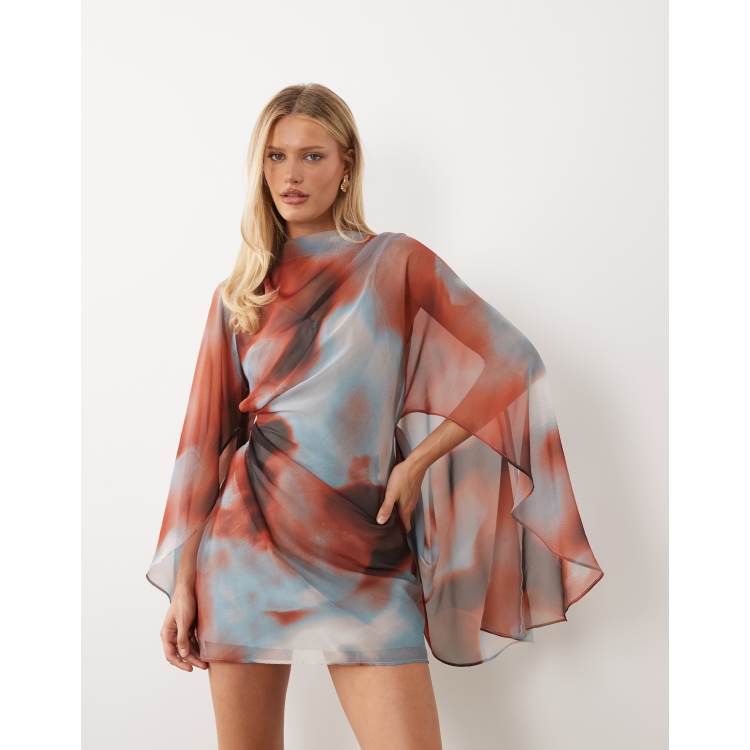 asos design mini dress with heavily embellished cape ASOS DESIGN supersoft cape overlay mini dress in black