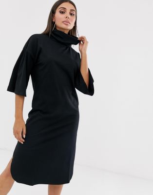 black trumpet sleeve dress
