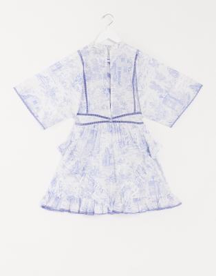 white dress with blue design