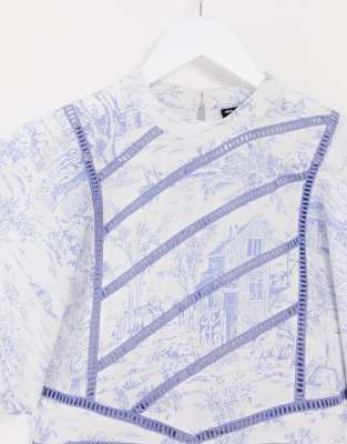 white dress with blue design